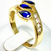 Bague - Bague en or jaune 800 sertie zirconiums et pierres synthétiques couleur saphir